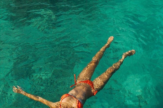 Swimming in an emerald cove on the Amalfi Coast reachable only from the water